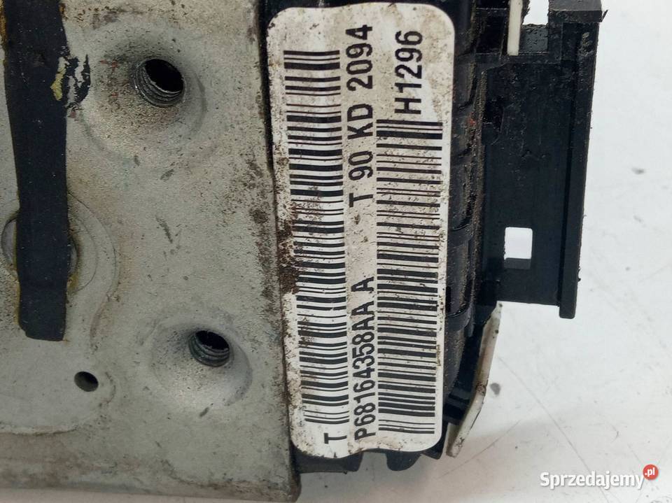 ZAMEK DRZWI PRAWY PRZÓD P68164358AA Jeep