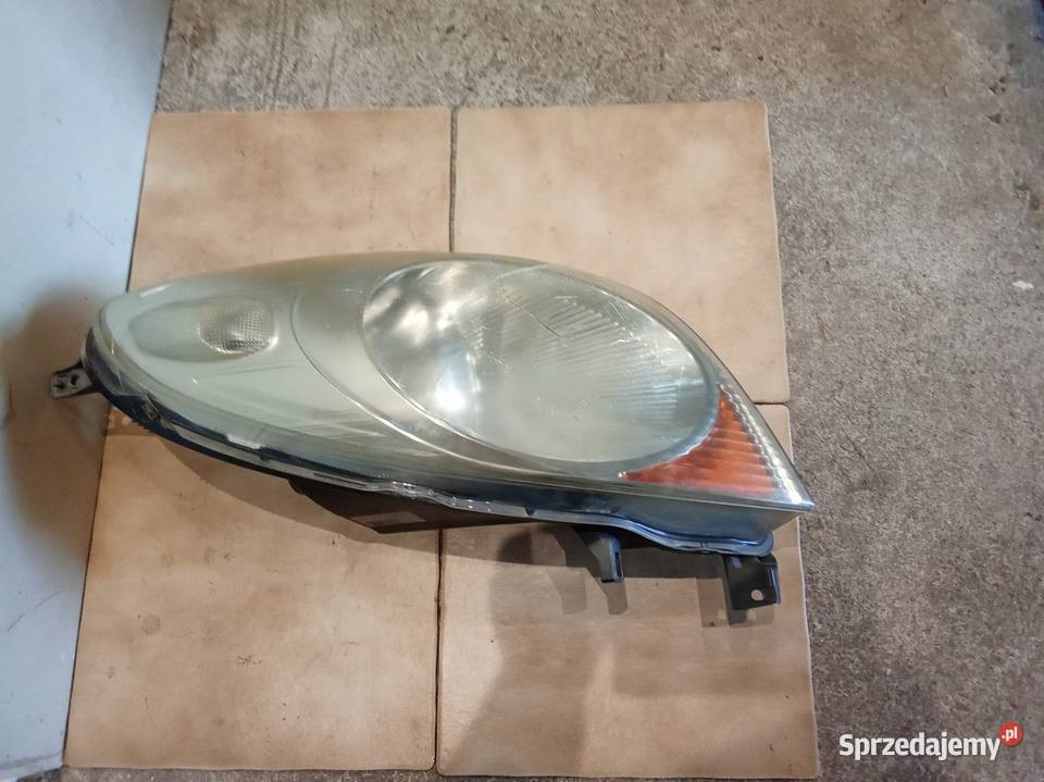 Nissan note e11reflektor lewy orginal Wrocław sprzedam