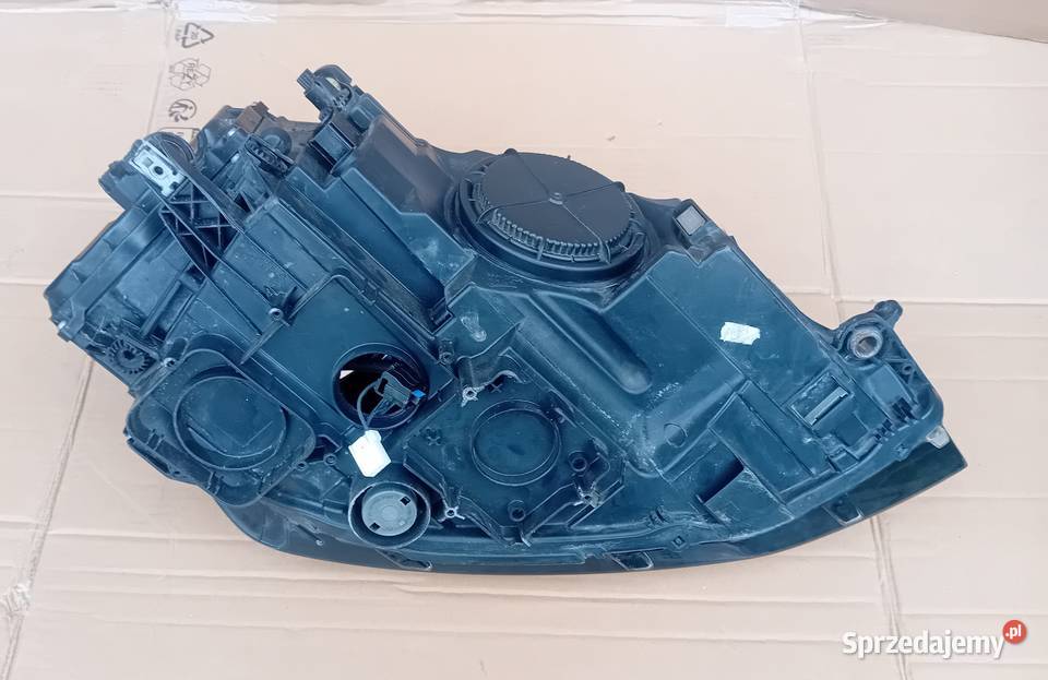 VW Golf VII Bixenon reflektor lampa lewy przód