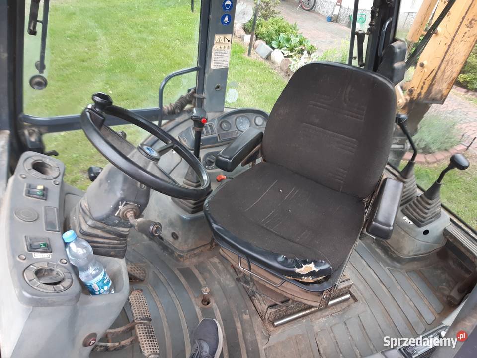 koparko ładowarka HolLand nh95 jcb cat case Majdan Królewski