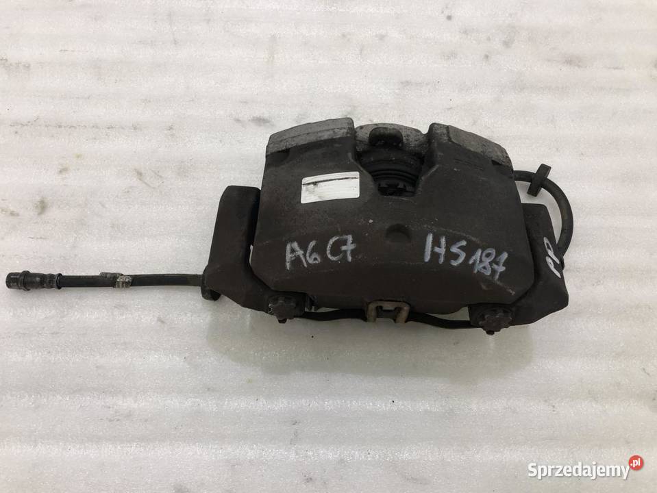 ZACISK PRAWY PRZÓD AUDI A6 C7 30TDI