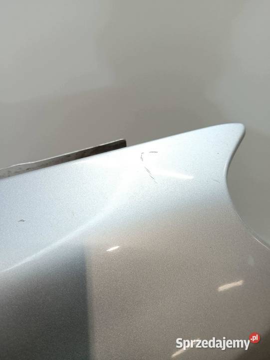 BŁOTNIK PRAWY PRZÓD SREBRNY Opel Astra III osobowe
