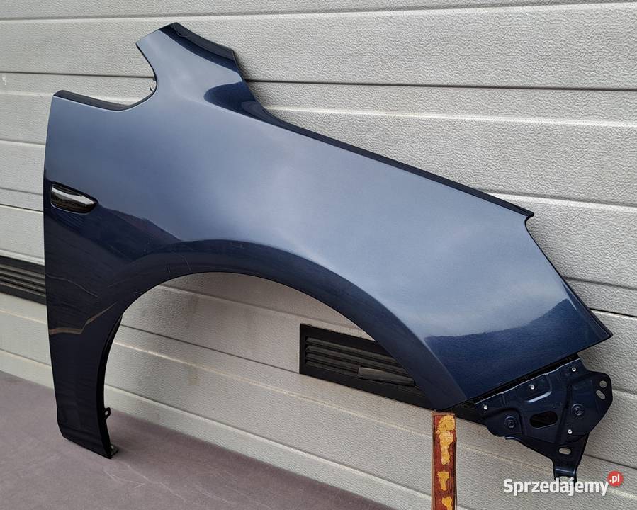 Błotnik prawy przód Opel Astra J 0915 Z22A Błotniki Mielęcin