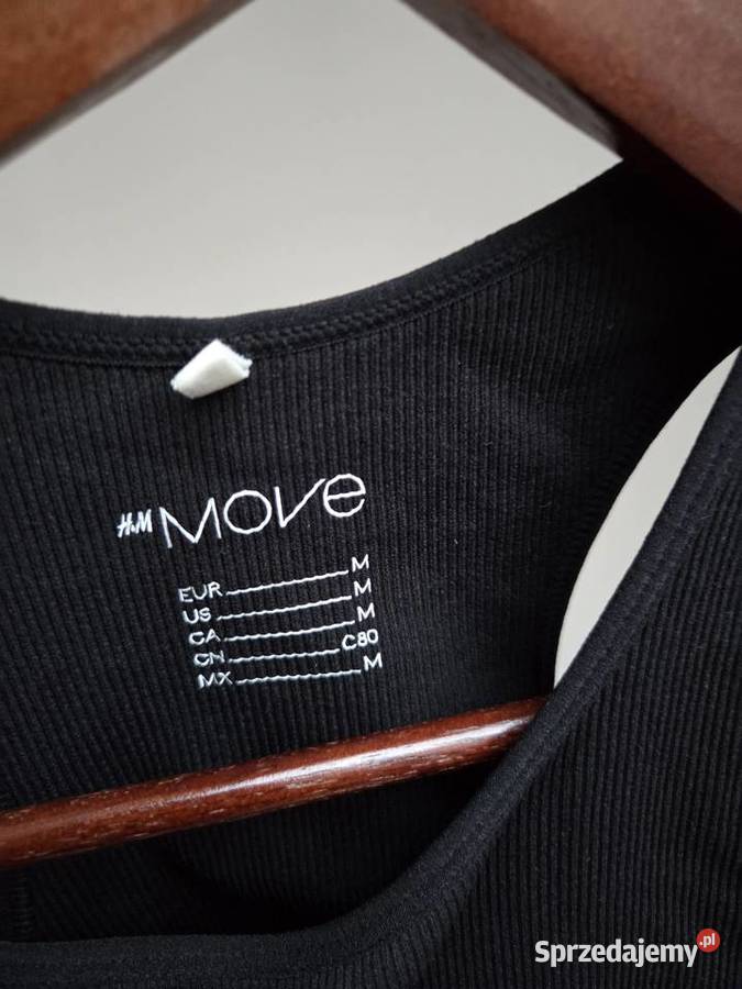 Czarny sportowy top bez rękawów w prążki HM Move Rozmiar 38(M) Liszki