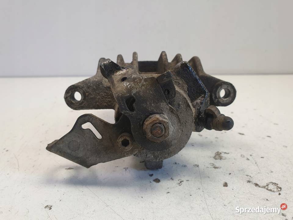 Skoda Octavia I ZACISK HAMULCOWY lewy TYŁ TYLNY osobowe