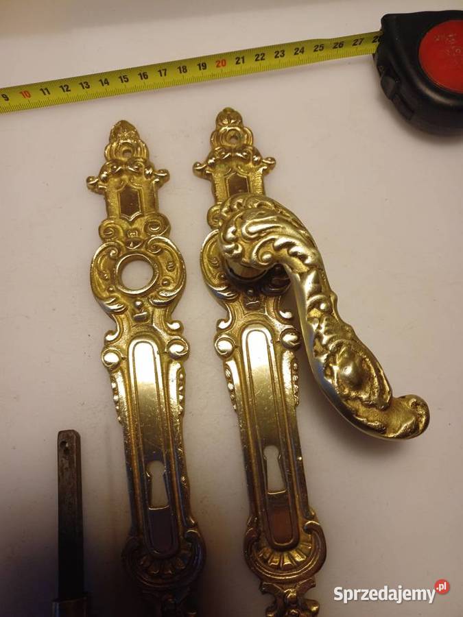 Komplet klamek i szyldów mosiężnych Poznań sprzedam
