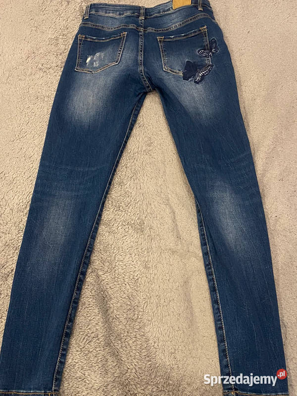 Dżinsyjeansy motylek wyszywany rozmiar L Rozmiar 40(L) Warszawa