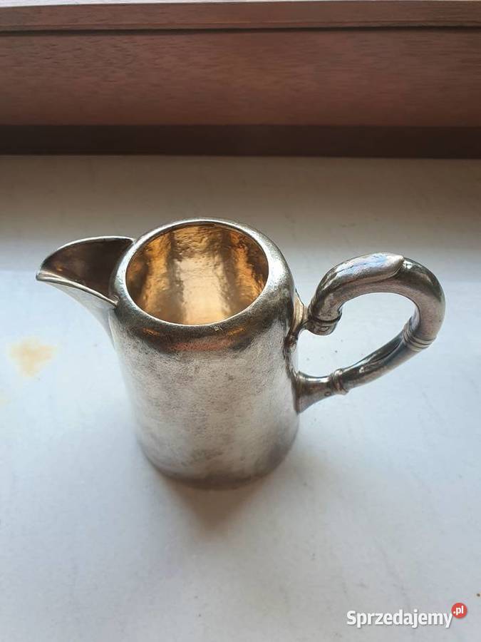 Stary ozdobny dzbanek z uchwytem z metalu w Antykwariat sprzedam