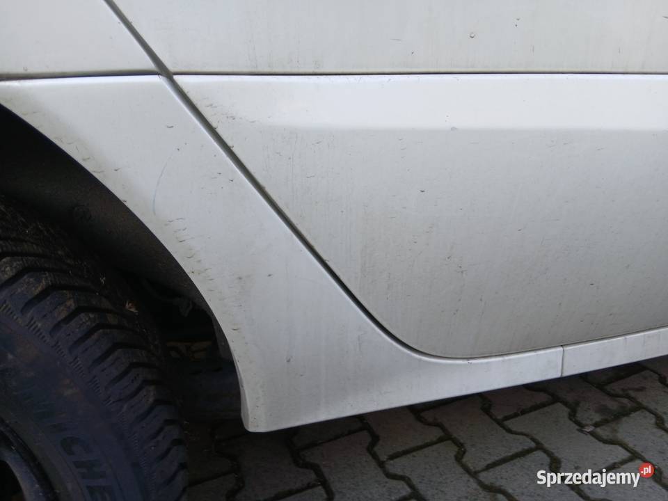 Renault Koleos 2010 nakładka progu prawy tył Listwy i nakładki Szczerbice