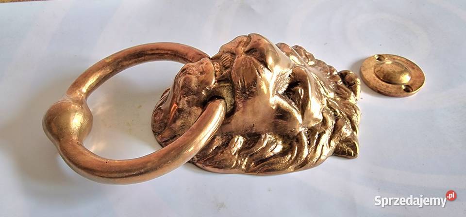 KOŁATKA dzwonek LEW do DRZWI MOSIĄDZ Książenice sprzedam