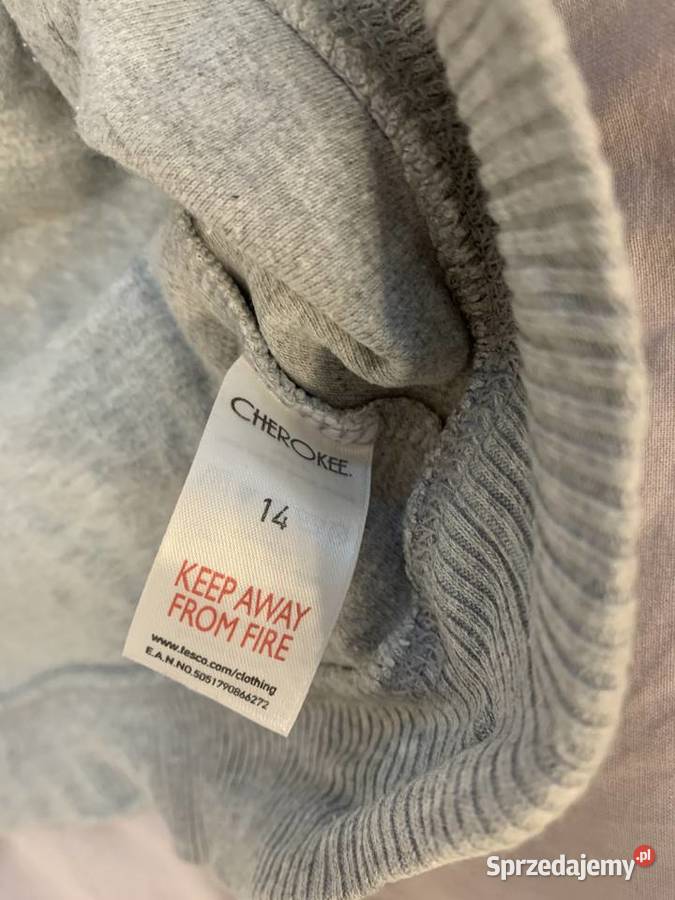 Bluza bezrękawnik bez rękawów z krótkim rękawem