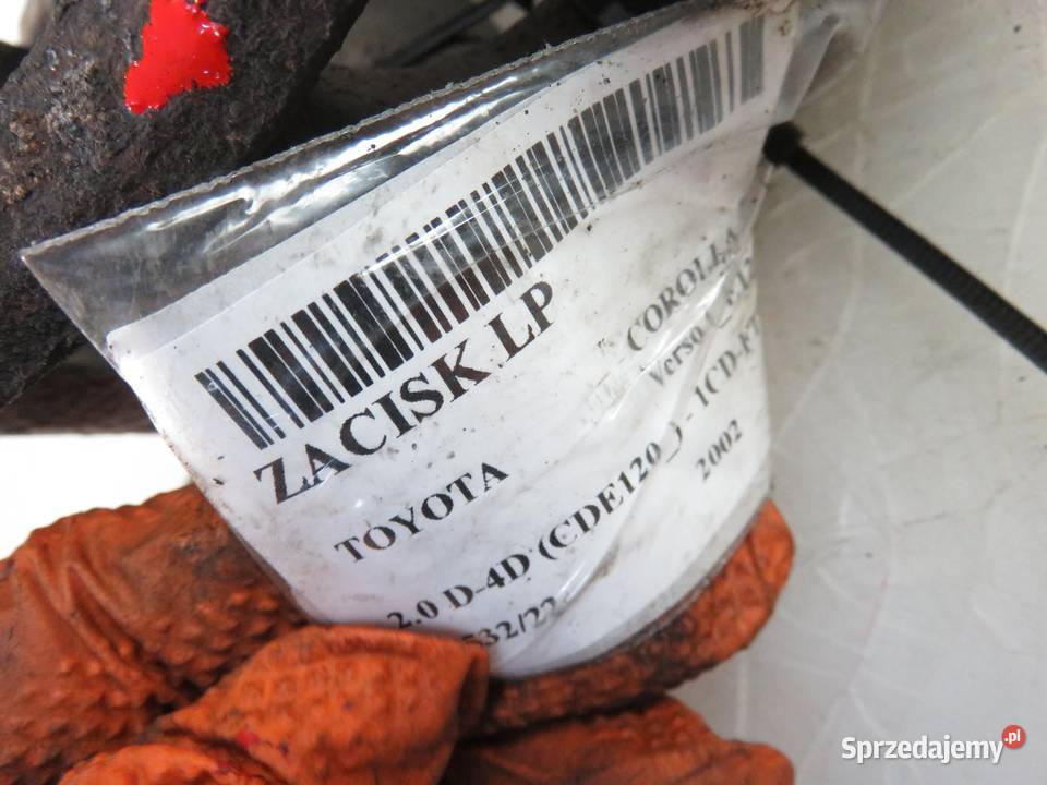 ZACISK LEWY PRZÓD TOYOTA COROLLA Verso 20 D4D