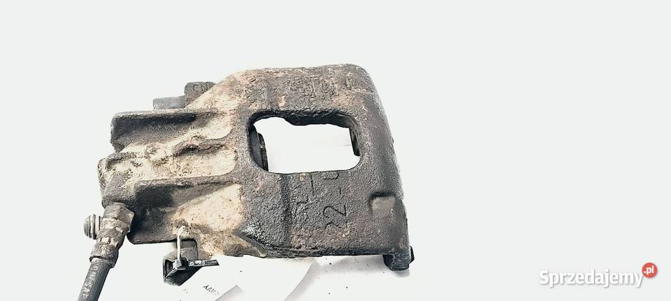 ZACISK HAMULCOWY PRZÓD PRAWY FORD FOCUS MK1 Lipno