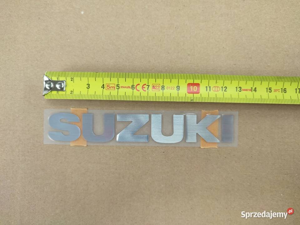 NAKLEJKA SUZUKI POD CZACHĘ L STR SUZUKI UG 110