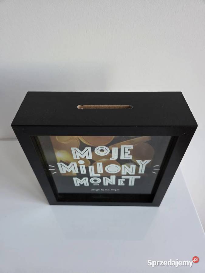 Czarna skarbonka z napisem Moje miliony monet Liszki sprzedam