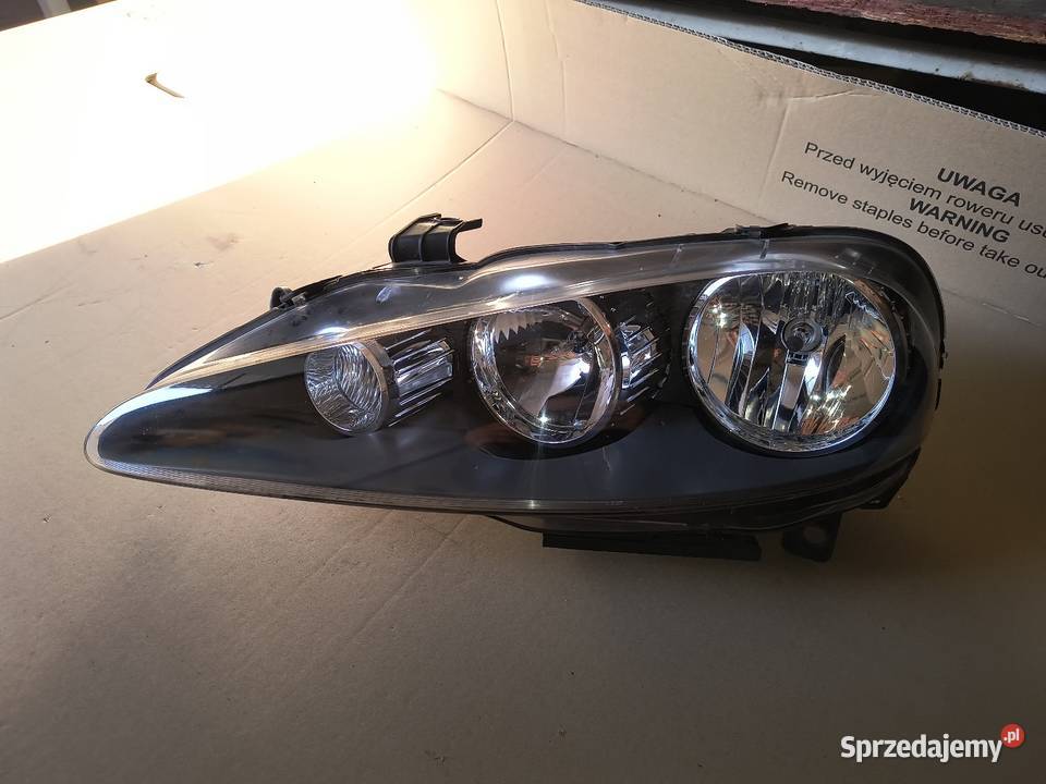 Alfa Romeo 147 lift Reflektor lewy kpl DEPO Domasław