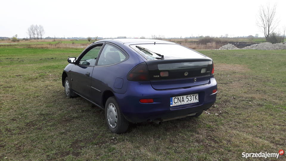 Mazda 323c automat granatowa aktualne opłaty Rok produkcji 1995