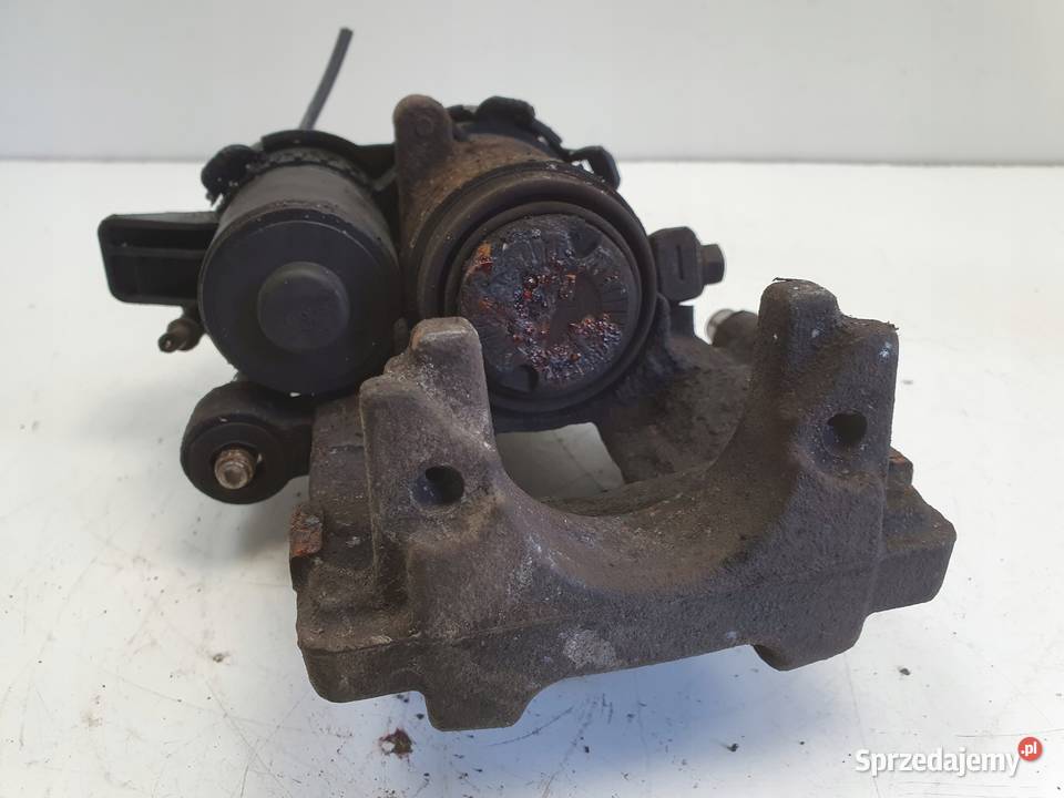 Volvo V60 XC60 II TYLNY ZACISK HAMULCOWY lewy Chełm