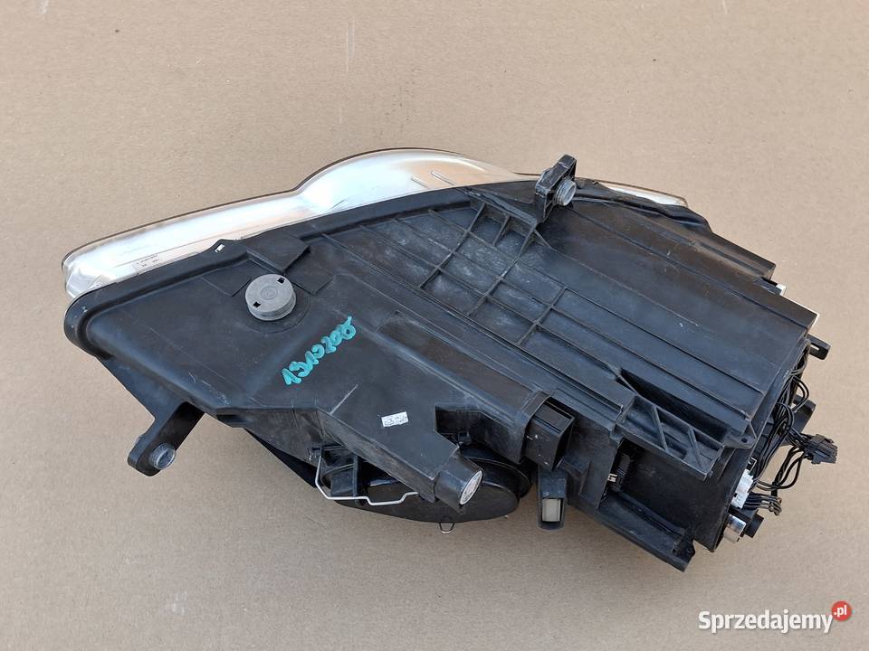 VW PASSAT B6 BIXENON REFLEKTOR LEWY LAMPA LEWA osobowe Bieleń