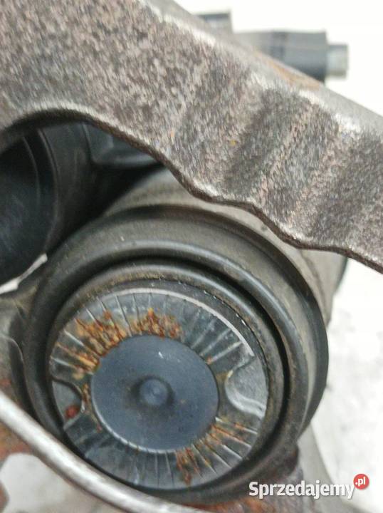 ZACISK HAMULCOWY LEWY TYŁ 20 TDI 5Q0615405GP Rok produkcji 2023