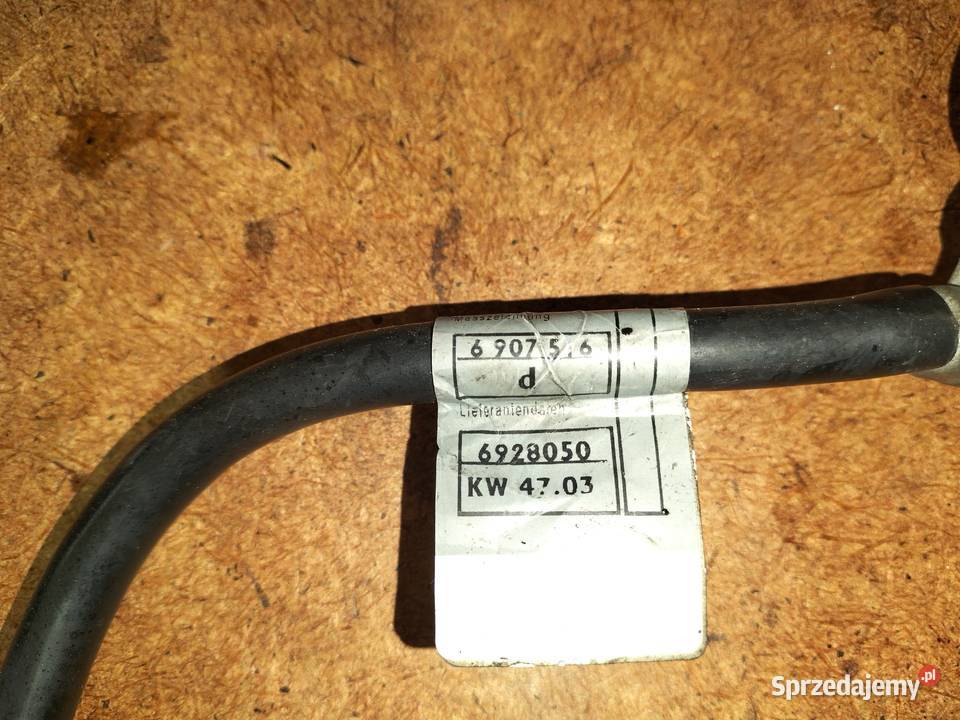 Klema minusowa akumulatora w bagażniku BMW E65