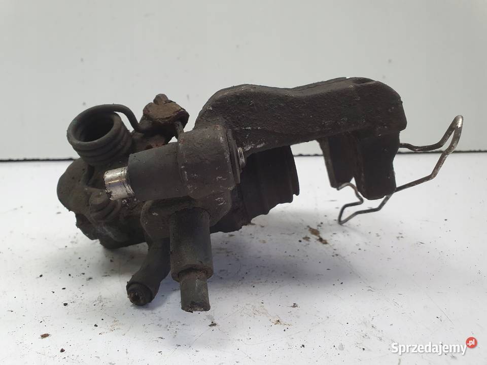 Volvo S40 V40 ZACISK HAMULCOWY Lewy tył kierowcy Rudka