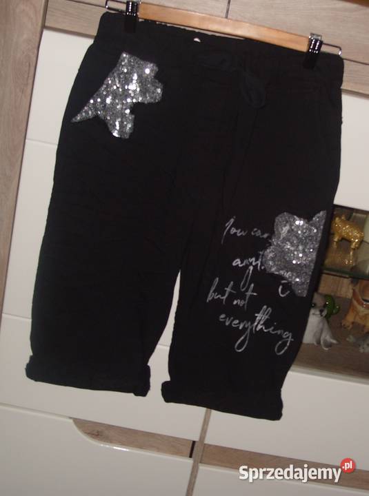 Gumowane spodenki rybaczki gnieciuchy cekiny r Spodnie Rawicz