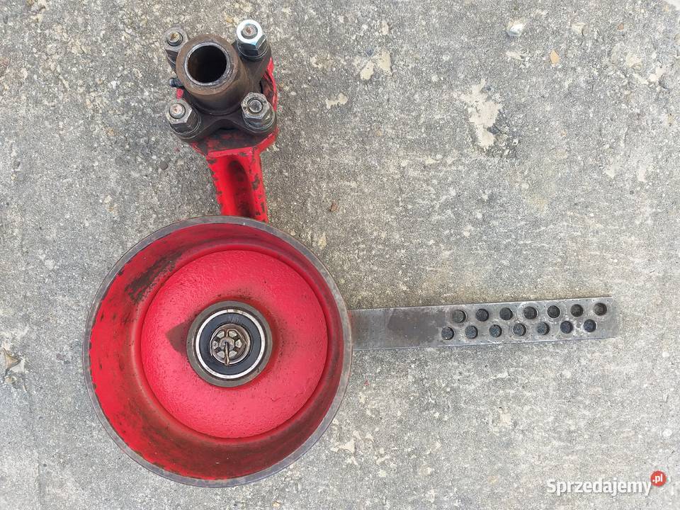 Napinacz pasa młocarni MF