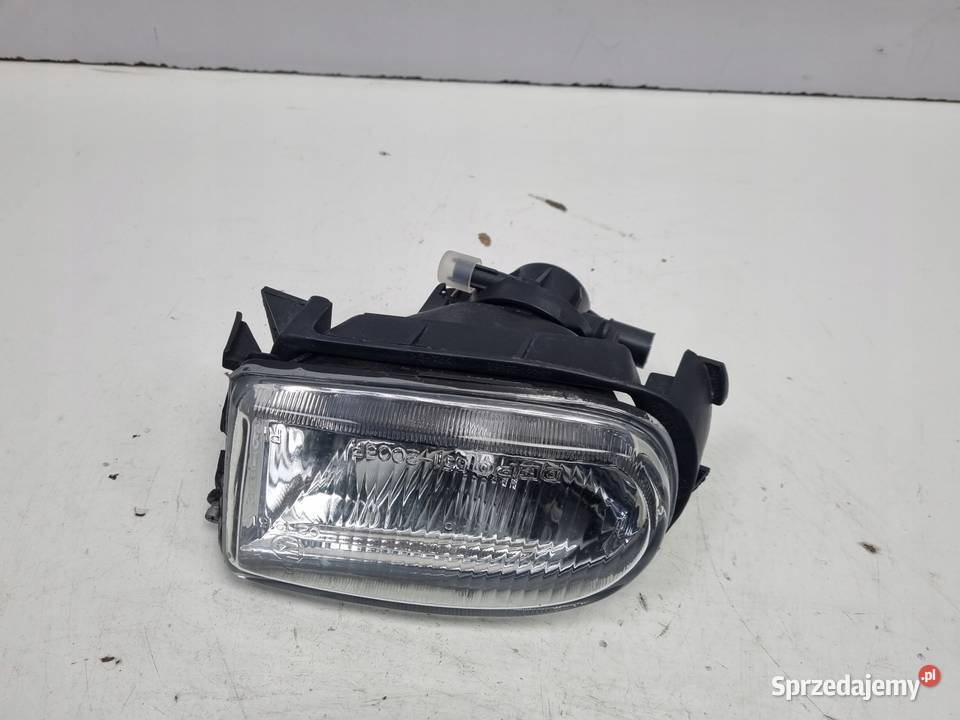 Renault Laguna I 9498r PRZEDNI HALOGEN PRAWY Rudka