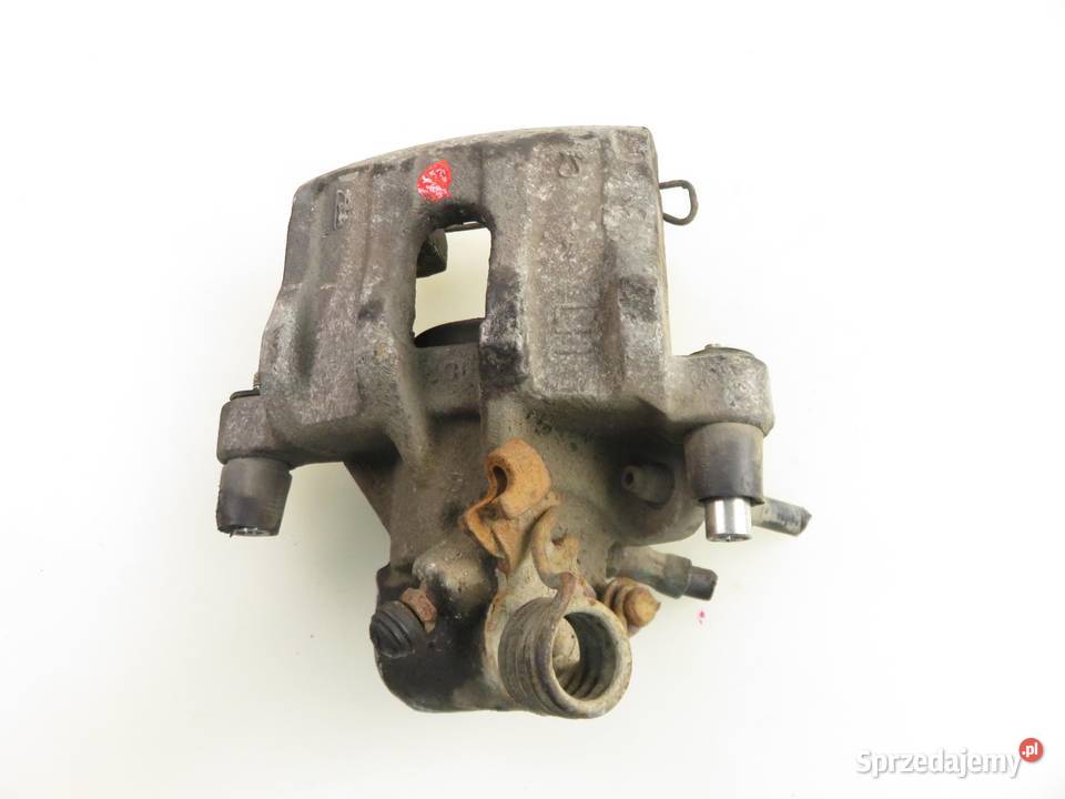 ZACISK LEWY TYŁ FORD FOCUS C DM2 18 QQDB Zaciski i jarzma