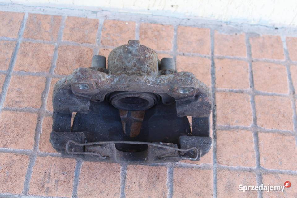 ZACISK HAMULCOWY PRAWY PRZÓD OPEL ZAFIRA B 19
