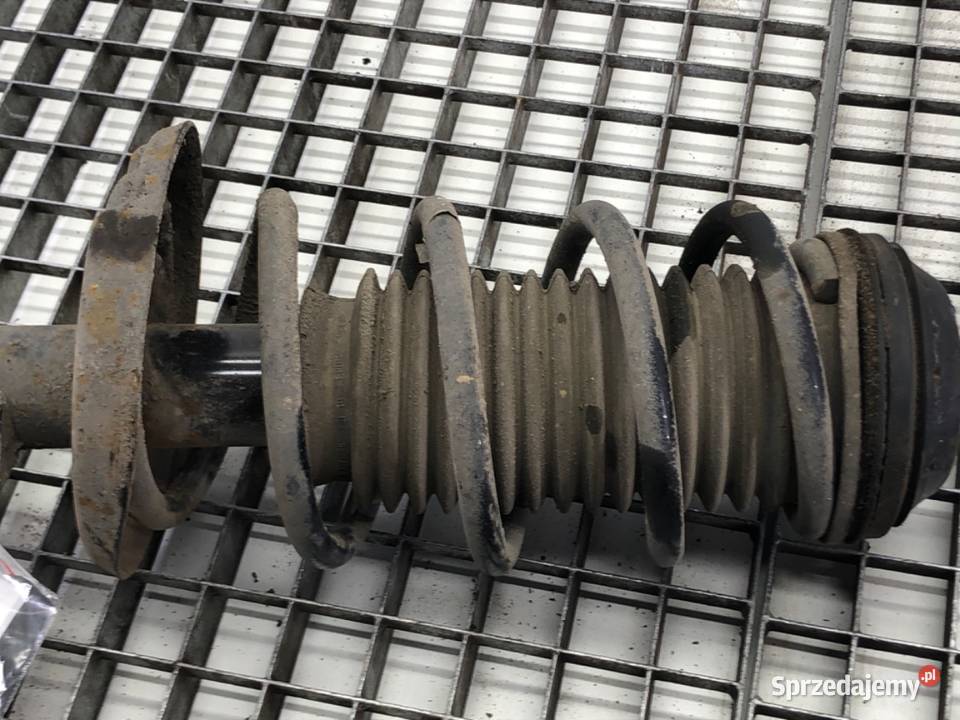 AMORTYZATOR LEWY PRZÓD ZE SPRĘŻYNĄ OPEL CORSA D