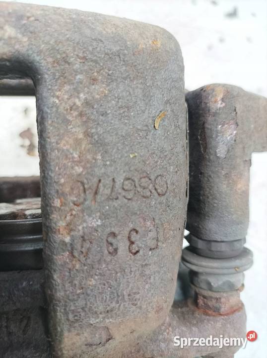 ZACISK HAMULCOWY LEWY TYŁ 32 FSI ELEKTRYCZNY