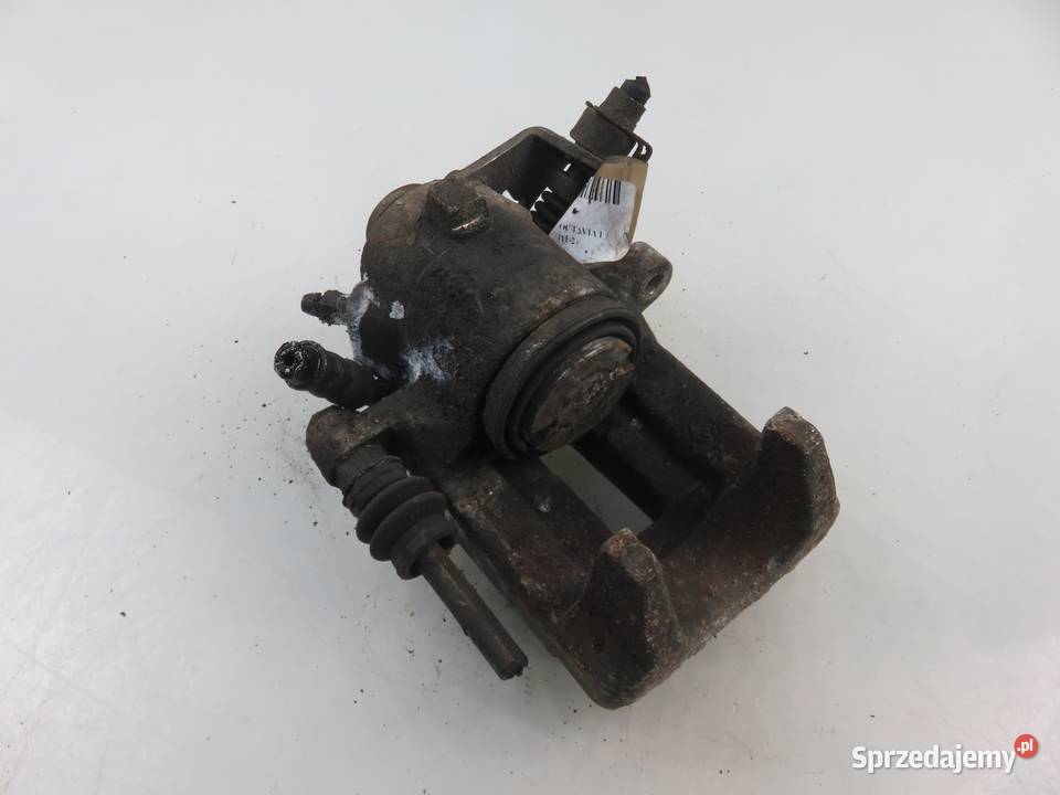 ZACISK PRAWY TYŁ SKODA OCTAVIA I 19 TDI ASZ