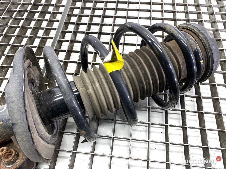 AMORTYZATOR LEWY PRZÓD ZE SPRĘŻYNĄ CHEVROLET