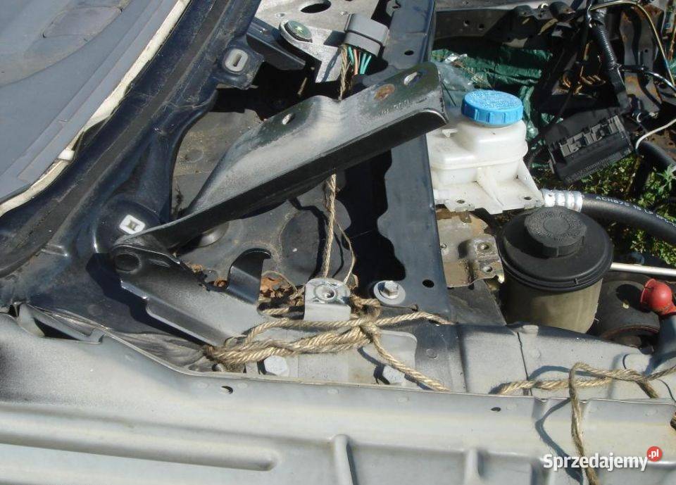 NISSAN ALMERA TINO ZAWIAS MASKI PRAWY