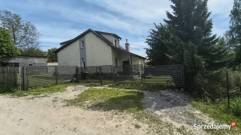 Dom w Dominowie stawami Dominów