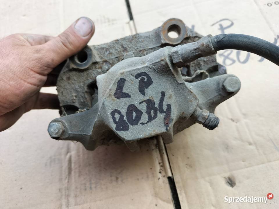 Audi 80 B4 ZACISK HAMULCOWY JARZMO LEWY PRZÓD osobowe Zaciski i jarzma Kamień-Kolonia sprzedam