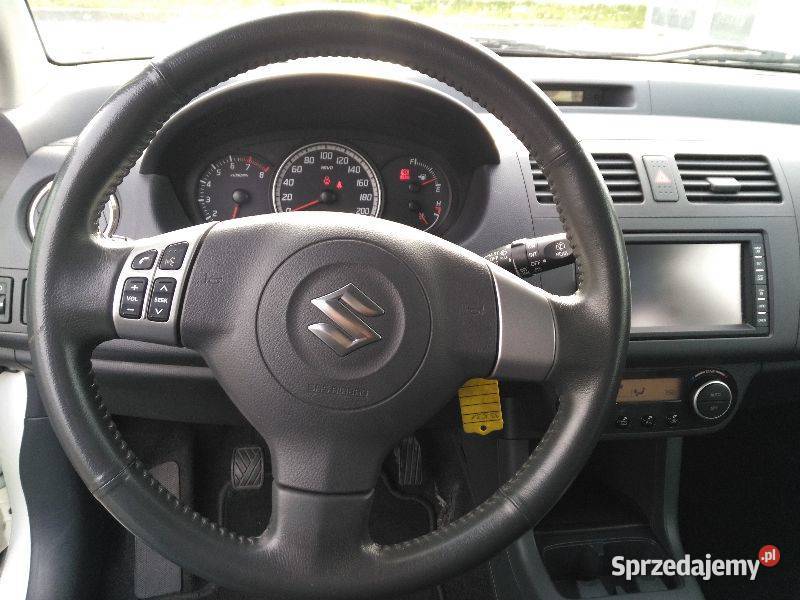 Suzuki Swift kolor PERŁA navigacja DVD welurowa tapicerka Tarnów