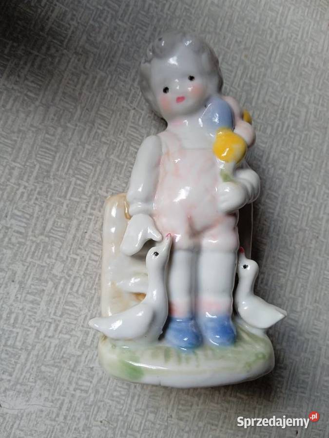Porcelanowa figurka chłopiec z balonami i kaczki Koźminek