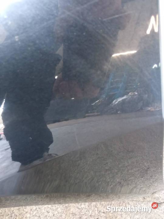 BŁOTNIK LEWY PRZÓD TEB66 Renault Laguna III 2007