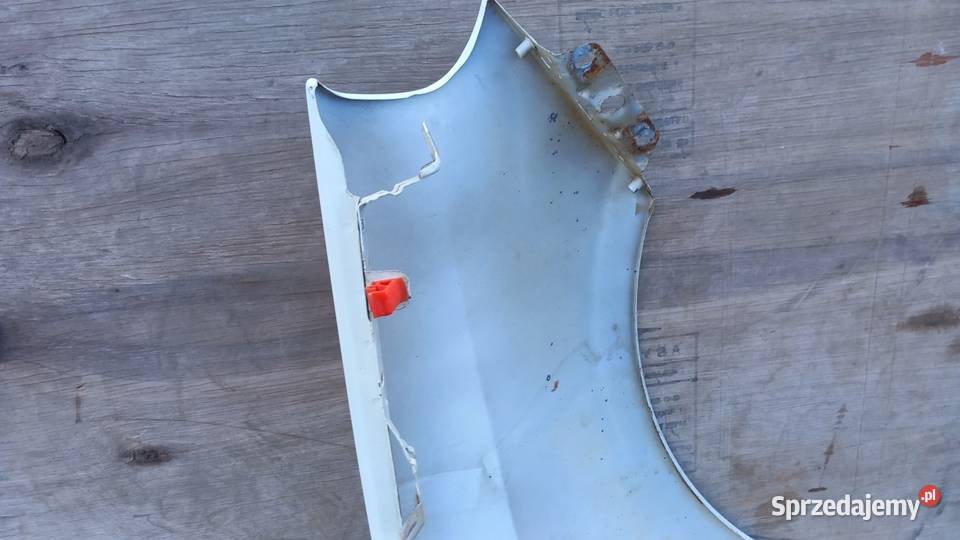 FIAT GRANDE PUNTO BŁOTNIK PRZÓD LEWY 296 Zbierkowo