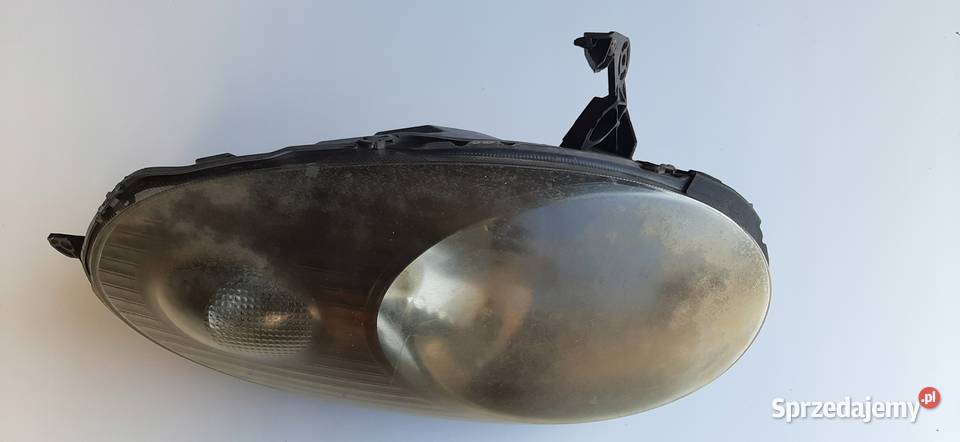 Lampa Przednia Lewa NISSAN MICRA K12 HB 3D 03 osobowe Nowy Tomyśl