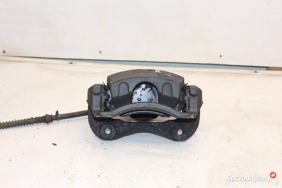 HYUNDAI TUCSON 20 16V 0410 ZACISK HAMULCOWY Prochowice