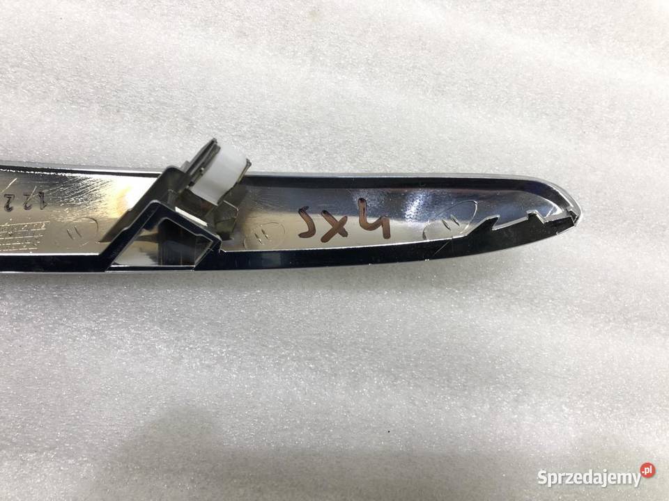 LISTWA KONSOLI LEWA CHROM SUZUKI SX4 7385280J1 Motoryzacja