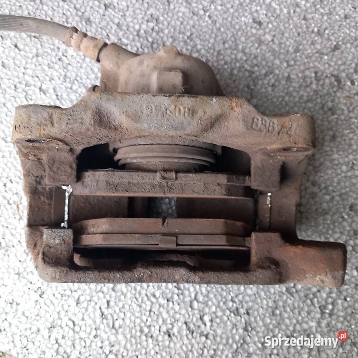 Lewy zacisk przód do Renault Scenic I Lift 19