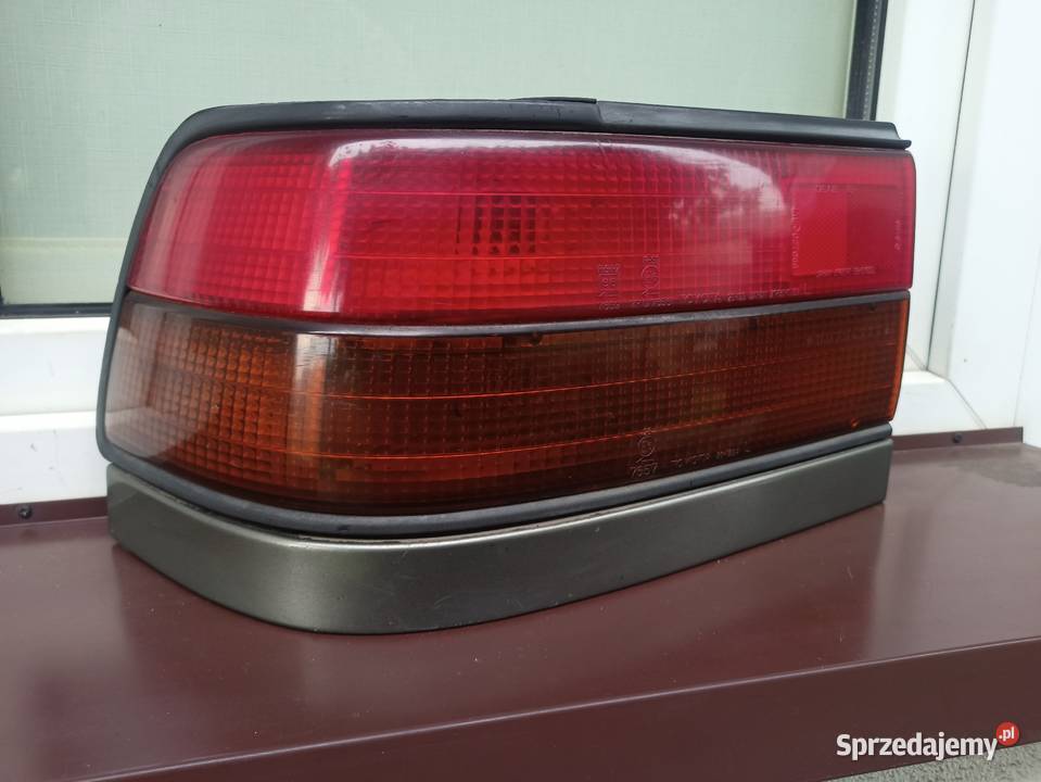 Toyota Carina II T170 lampa tył tylna lewa Oświetlenie Sieradz sprzedam