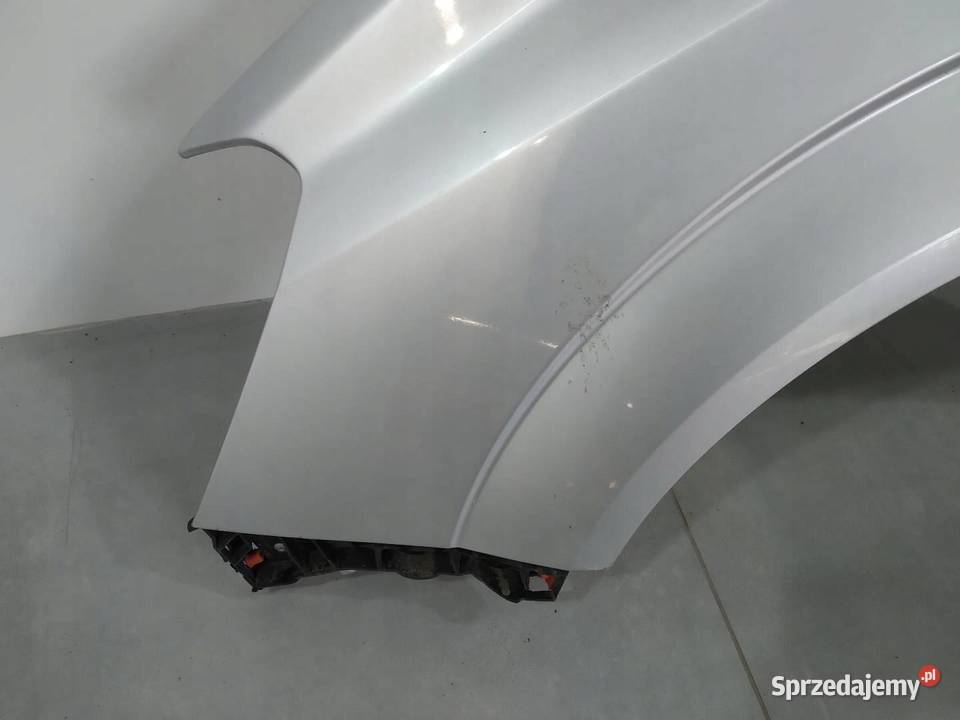 BŁOTNIK B LEWY PRZÓD SREBRNY Z157 Opel Zafira II Błotniki