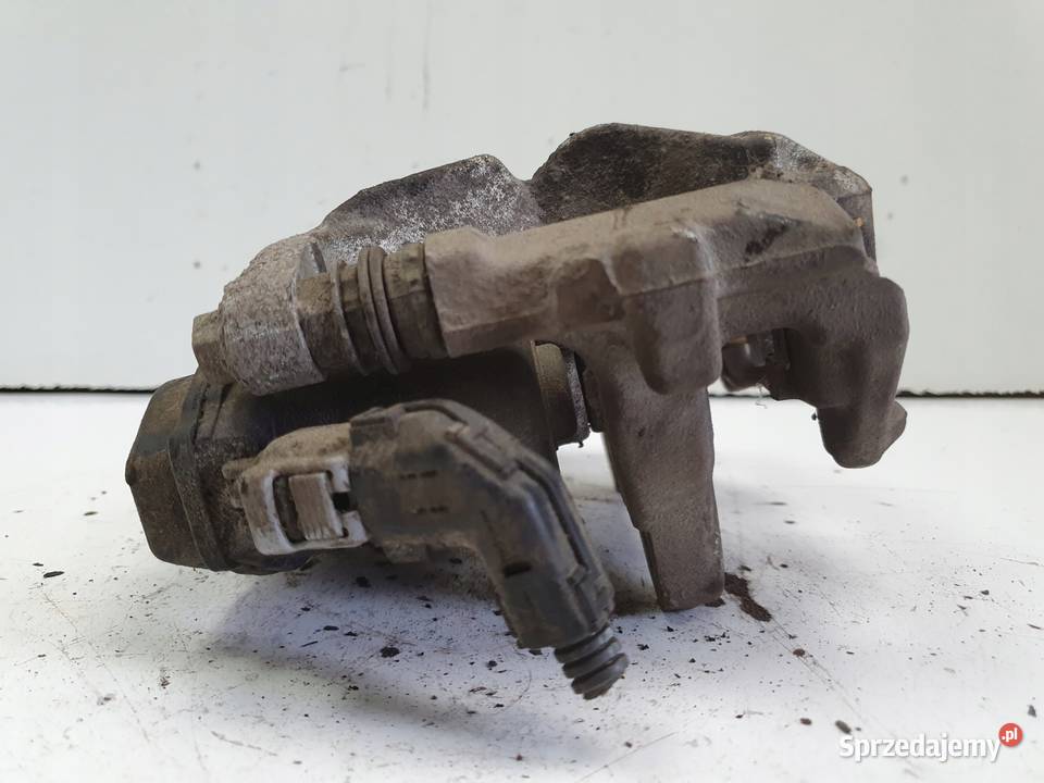 Toyota CHR TYLNY ZACISK HAMULCOWY lewy tył