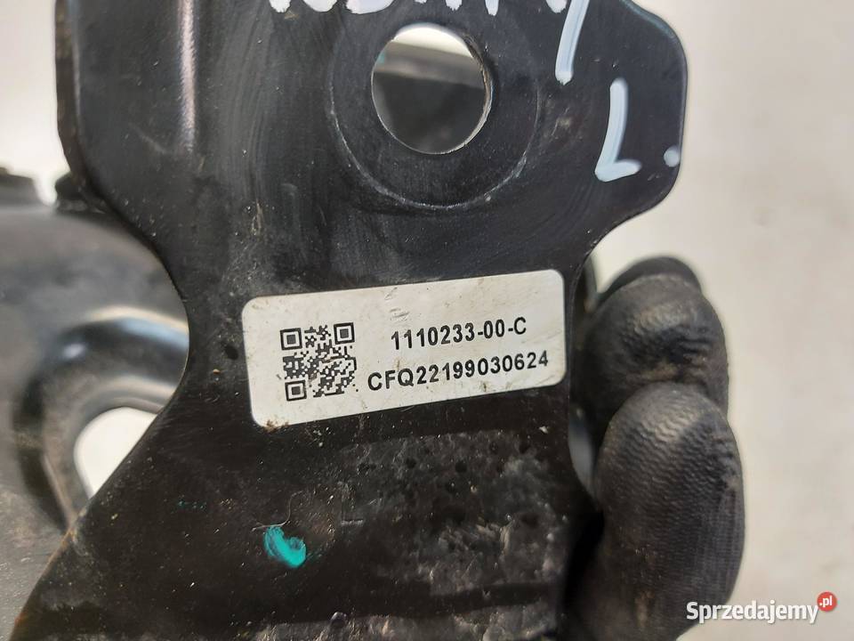 TESLA MODEL Y 2022r ŁAPA UCHWYT MOCOWANIE LEWE